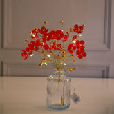 Red Blossoms in Crystal Vase